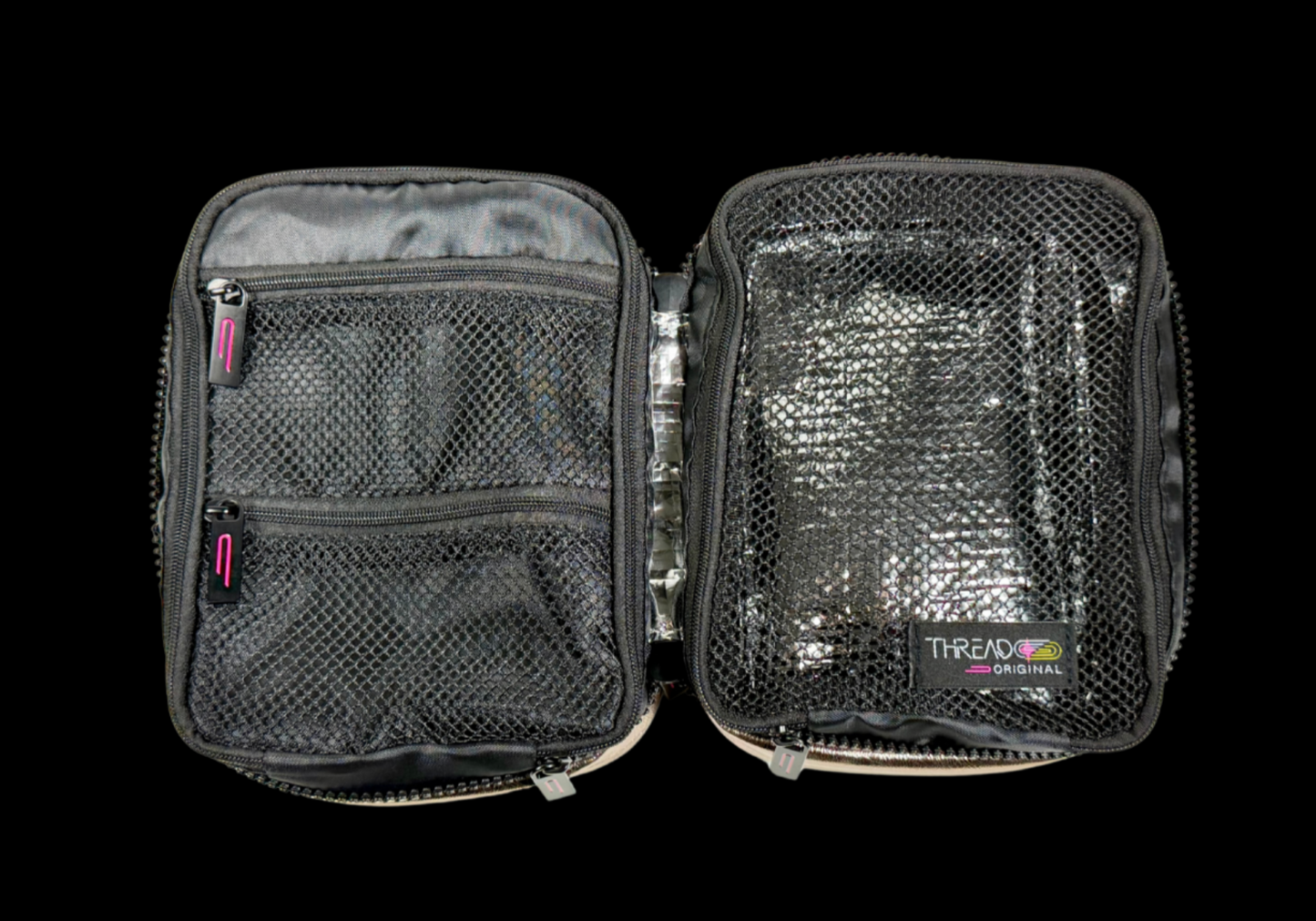 Multi-compartment makeup organizer with mesh zip pockets and wipeable insulated interior by Thread Original.