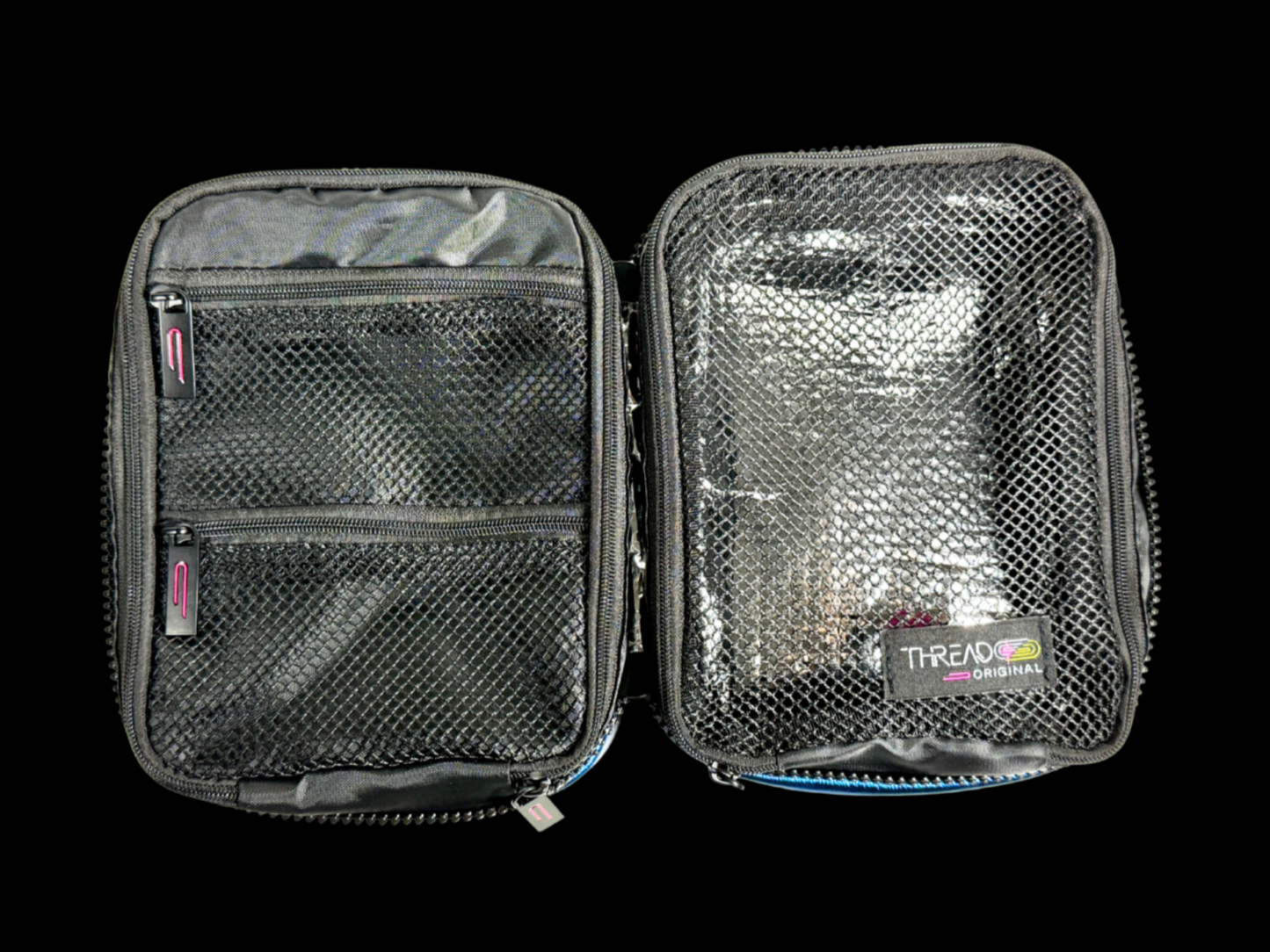 Multi-compartment makeup organizer with mesh zip pockets and wipeable insulated interior by Thread Original.